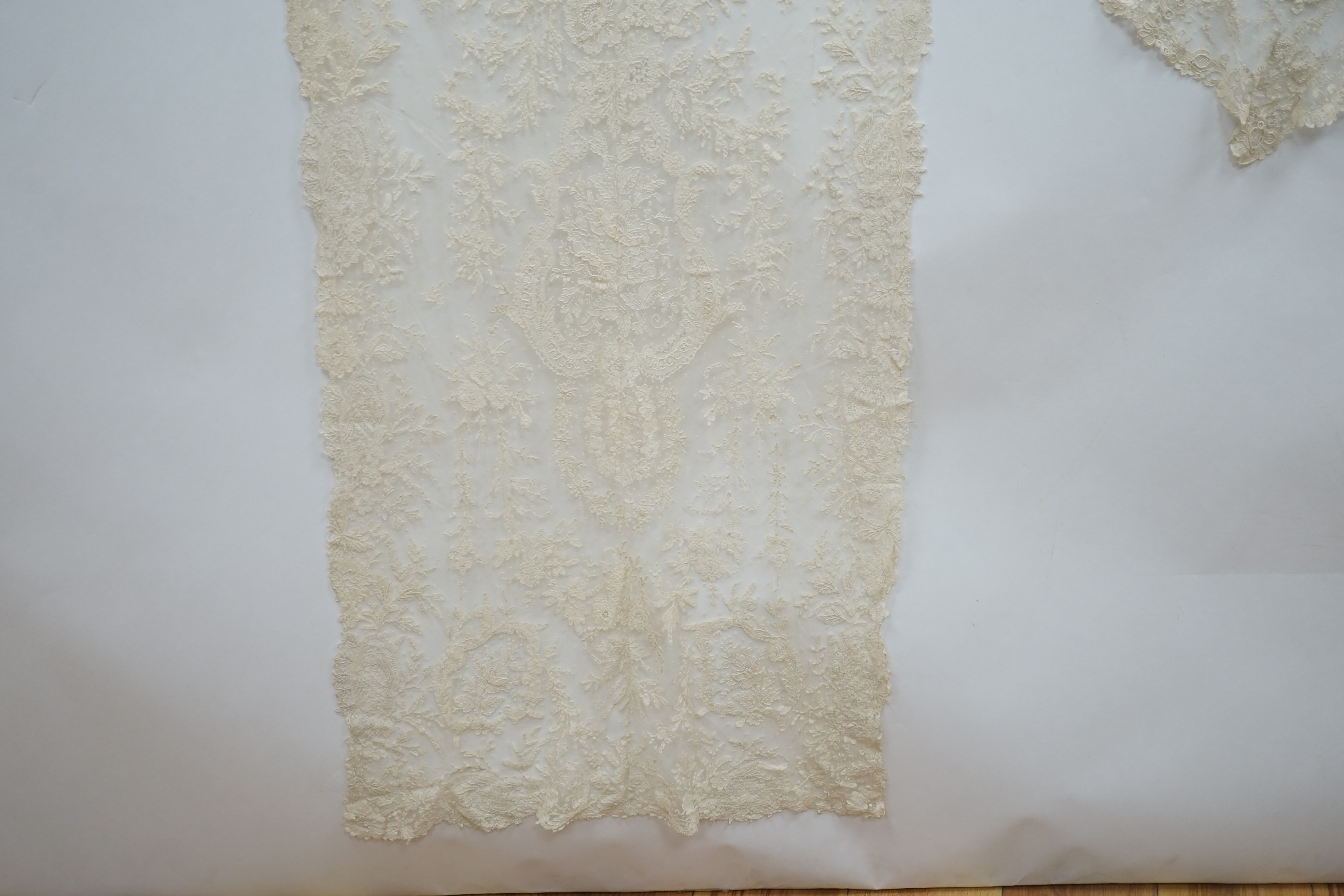 A mixed Brussels lace berth with fine needle lace floral insertions, together with a mixed bobbin veil and needleworked Brussels stols